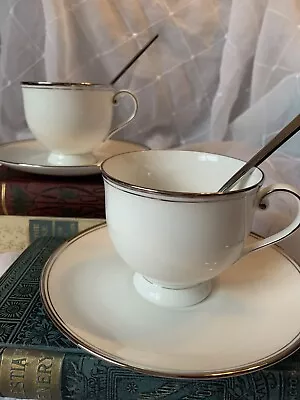 2 Mikasa Bone China Footed Cups And Saucers In Gothic Platinum + 2 Oneida Spoons • $15