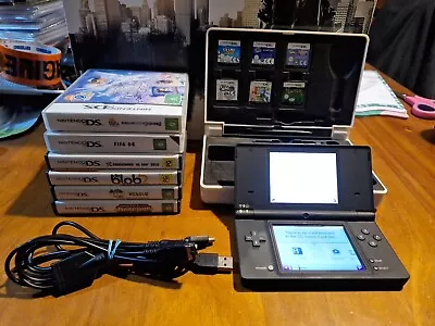 Black Nintendo Ds With 12 Games And Charger With Carry Case • $10.50