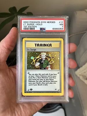 $50 • Buy PSA 7 Lt. Surge Holo 2000 Pokemon 1st Edition Gym Heroes 17/132