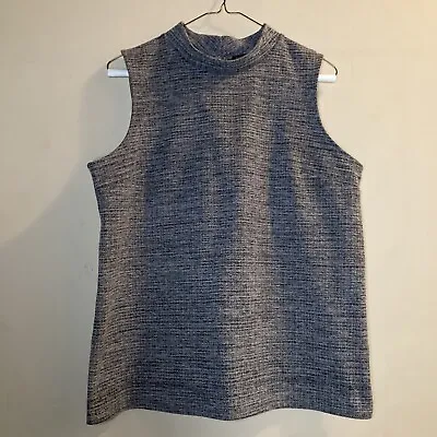 Banana Republic Sleeveless Shell Top. Mock Turtleneck Two Buttons In Back. • $19.99