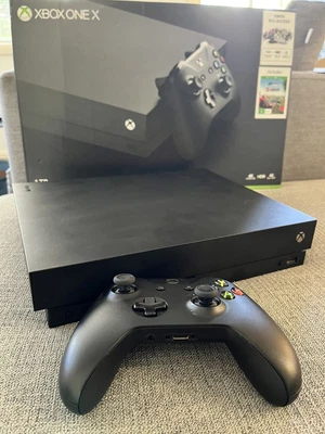 $148 • Buy Microsoft Xbox One X 1TB Home Console - Black