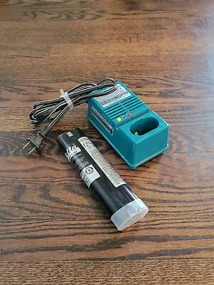 Makita Drill Fast Charger Model DC9700 7.2V With Battery 9000 9.6V  “Pre-owned  • $28.98