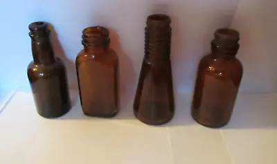 Lot Of 4 Small Brown Glass Bottles • $8.95