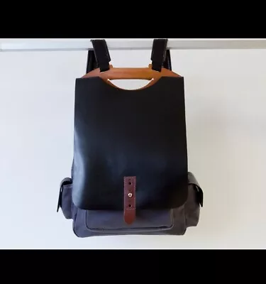 Leather And Canvas Laptop Backpack • $25