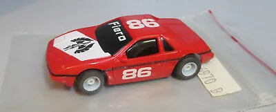  New Os  Tyco #86 Red Fiero On A Hp7 Chassis Ho Slot Car • $24