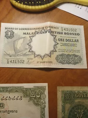 Malaya & British Borneo  1 Dollar  1959  Circulated • $50