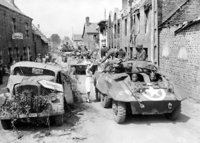 WWII B&W Photo M8 Greyhound Armored Cars Enter French Village WW2 • $12.95