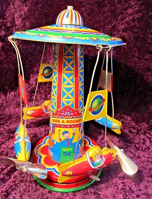 Vintage SCHYLLING TIN TOY   Ride-A-Rocket   SPINNING CAROUSEL ~ Dated 2011 ~ 8x4 • $28.50
