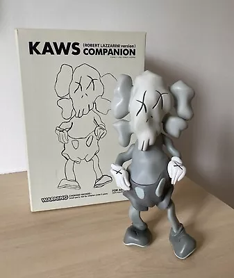 KAWS X Robert Lazzarini Distorted Companion (Grey) + Banksy Stik Dface Sticker • £1950