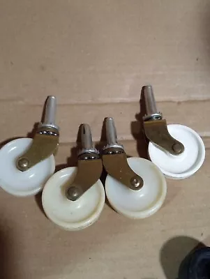 Set Of 4 Vintage White Plastic And Brass Caster Wheels 2  Wheel 1.75  Post VTG! • $12.50