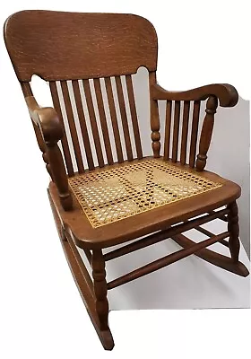 American Tiger Oak With Cane Seat And Arms Rocking Chair Rocker 33  H X 23  W • $350