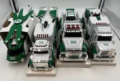 LOT Of (4) Hess Holiday Toy Truck Tractor Race Car Jet Helicopter Rescue Trucks • $0.99