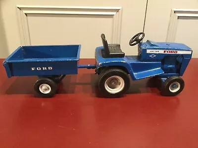 Vintage Ertl Ford Lawn And Garden Tractor And Trailer LGT 145 #814 1/12. • $55.95