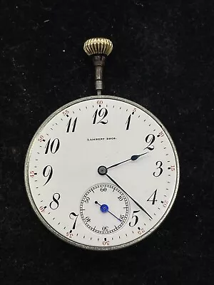 Vintage Lambert Bros. Pocket Watch Movement Dial Hands Crown WORKING • $19.99