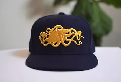 Kraken Cap: Designer Octopus Cap. Blue Background With Stitched Golden Kraken • $33
