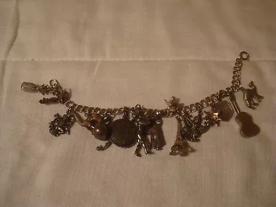 Vintage Charm Bracelet With 16 Silver Charms • $39
