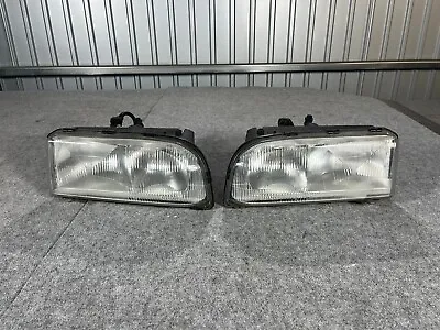 1991-1997 Volvo 850 R Genuine Head Lights Lamps Hella 301-142 000-01 • $212.50