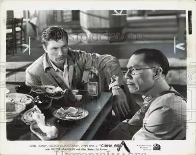 1943 Press Photo Actors George Montgomery And Paul Fung In  China Girl  • $19.99