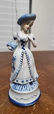 Vintage Music Box Figurine Lady In White Trimmed Blue Gold Love Story 9 1/2  • $10