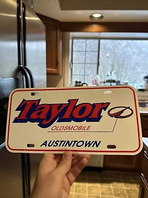 1990s Taylor Oldsmobile License Plate Austintown Ohio License Plate Plastic • $14.99
