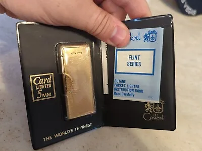 Vintage Colibri Card Lighter Gold Tone With Pouch And Manual World's Thinnest • $70
