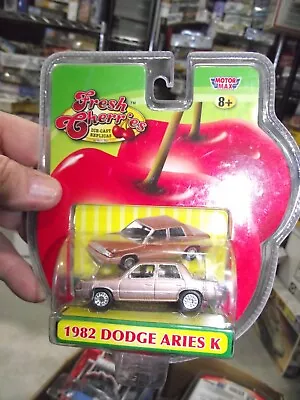 Motormax 1/64 Fresh Cherries 1982 Dodge Aries K NIB • $0.01