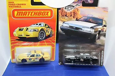 Matchbox-Emergency-Lot Of 2-Texas Trooper '93 Mustang & '06 Crown Victoria Taxi • $5.25