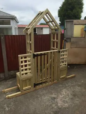 Garden Arch With A Gate Side Planters And Trellis.  • £350