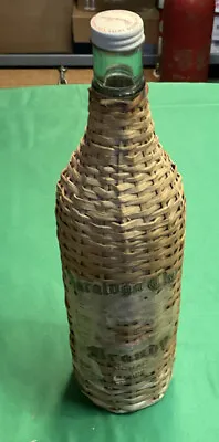 1960 Anglo Swiss Vintager  - Vinos Y Licores - Wicker Wrapped Bottle - 13”EMPTY • $31.50