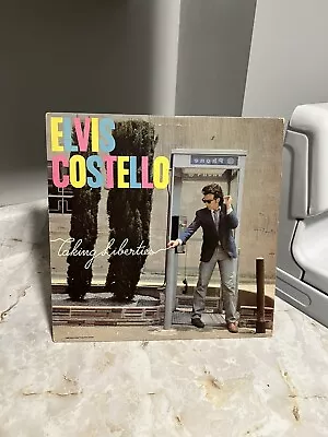 Elvis Costello – Taking Liberties 1980 1st Press Vinyl LP (G+VG) • $10