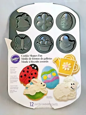 $13.99 • Buy Wilton Cookie Shapes Pan 5 Designs Rabbit Egg Lamb Ladybug Watering Can New