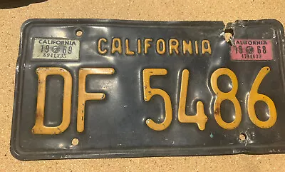 Vintage CALIFORNIA BLACK AND YELLOW LICENSE PLATE WITH '68 & '69 STICKERS • $30