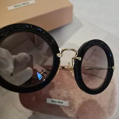 Miu Miu Sunglasses • £100