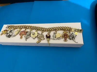 Vintage Nolan Miller 11 Charm Bracelet Birds- Flowers--Palm Tree- Lobster 7.5  • $115