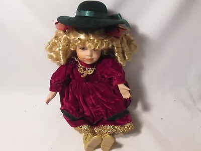 Collectors Choice Musical Porcelain Doll Seated • $12.37