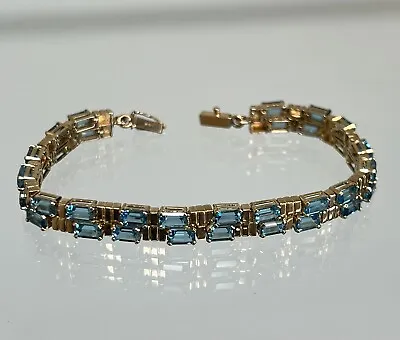 14K Yellow Gold & Blue Topaz Tennis Bracelet 6.75  • $700