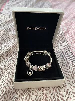 Pandora Bracelet With 12 Charms (1 Gold Charm) • $350