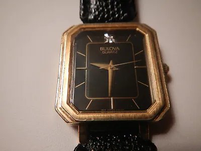 Vntg Bulova Quartz Goldtone Black Face Diamond 1 Jewel Watr Resistant Watch Runs • $17.99