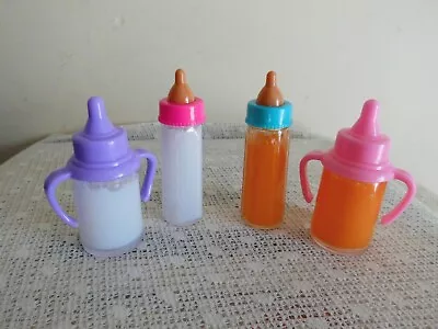 4 X  Magic  Bottles---2 X Milk & 2 X  Orange Juice Bottles  4/dolls/reborn • $10