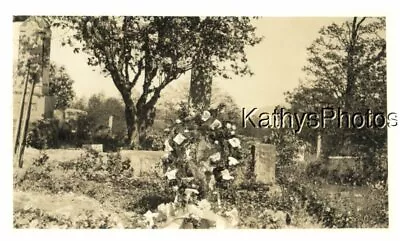 Found B&w Photo H_2311 Flowers At A Burial Site • $6.98