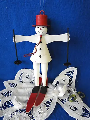 Vintage Tin Metal Snowman Hand Painted Dangling Legs Skiing Christmas Ornament • $8.95