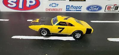 Yellow AFX #7 Dodge Daytona 1:64 Slot Car W/Magnatraction Chassis • $34.99