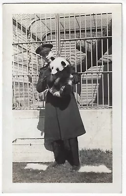Man In Uniform Holding Panda Bear In Front Of Cage Vintage Photo • $3.95