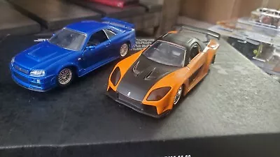 Jada Fast And Furious Brian's Nissan Skyline GT-R R34 Blue & Han's RX-7.  1:32 • $10