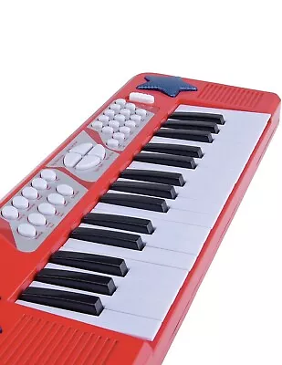 Chad Valley Electronic Keyboard 32 Piano Keys And 8 Rhythm Buttons - Red  • £20.99