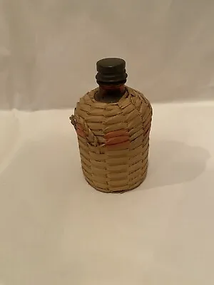 Small Antique Wicker Wrapped Brown Glass Bottle • $50