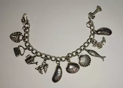 Vintage Silvertone Fish / Shells / Horses / Purse / Locket & More Charm Bracelet • $11.99