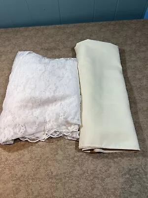 2 Vintage Tablecloths 1 White Lace 108”x65” 1 Beige Linen 83”x59” • $18