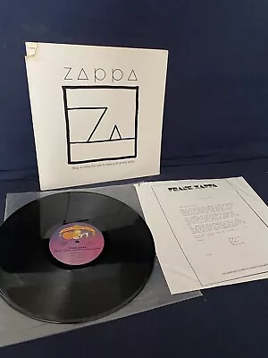 1982 Frank Zappa “Ship Arriving Too Late To Save A Drowning Witch” LP FW-38066 • $4.50