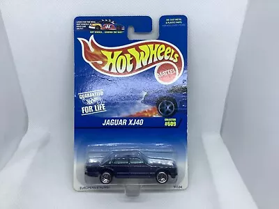 Hot Wheels 1997 Blue Jaguar Xj40 #609 • $2